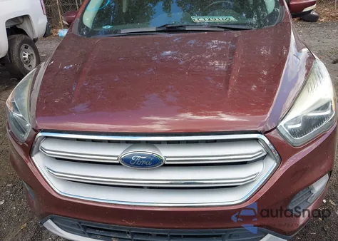 2018 Ford Escape Titanium z USA, uszkodzony, nr VIN 1FMCU0J97JUA48843